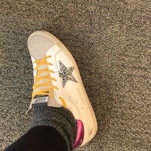 Golden goose sparkly star purple trim